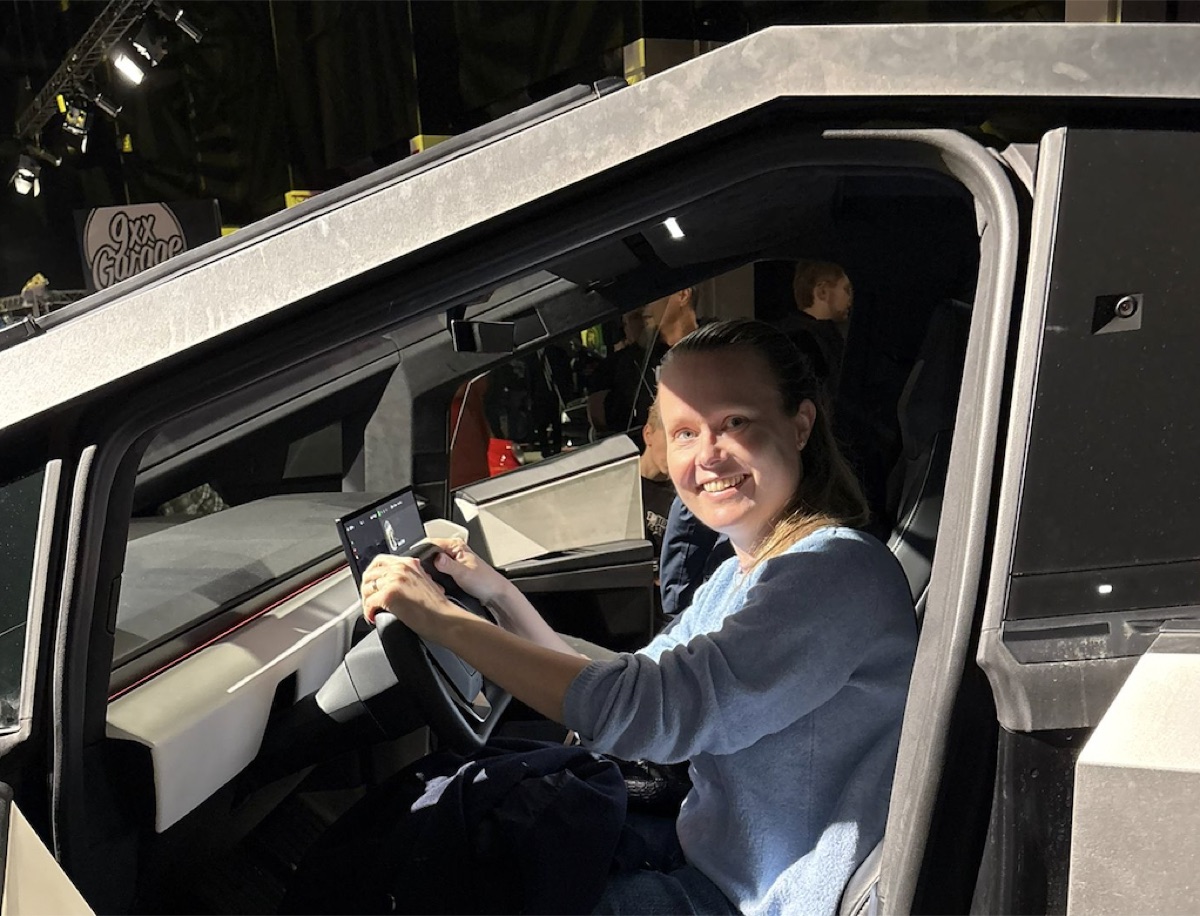 Nina Patkai sitting in an automotive prototype at a technology event